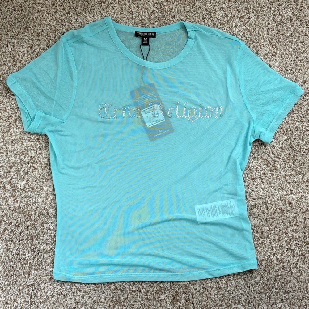True Religion mesh t-shirt featuring a rhinestone logo graphic.